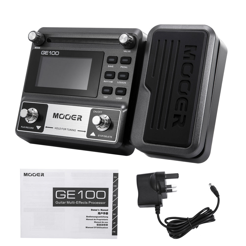 GE100 Guitar Effects Pedal set including the pedal unit with various control knobs and buttons, a expression pedal, a power adapter, and a user manual.