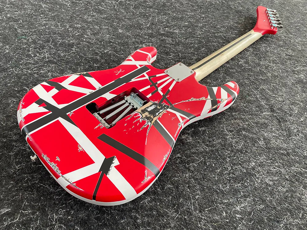 Reprodution of Eddie Van Halen’s I Iconic Electric Guitar with Tremolo Leaning Bridge Pickup,banana long head, Black and White Stripes,High Quality,free shipping