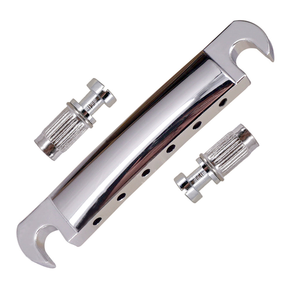 Chrome guitar bridge assembly with two tuning machines on a white background