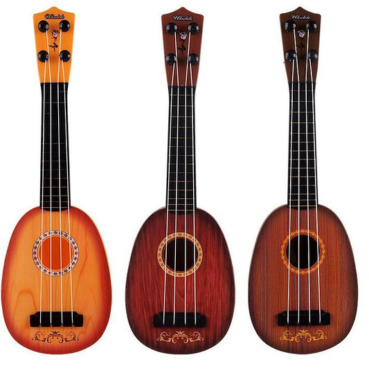 Three plastic ukulele toys in different colors designed for children.