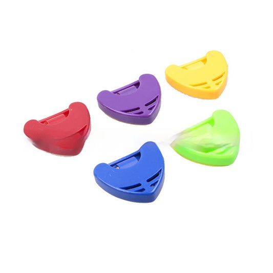 A collection of large triangle shaped guitar pick holders in various colors including red, purple, yellow, green, and blue.
