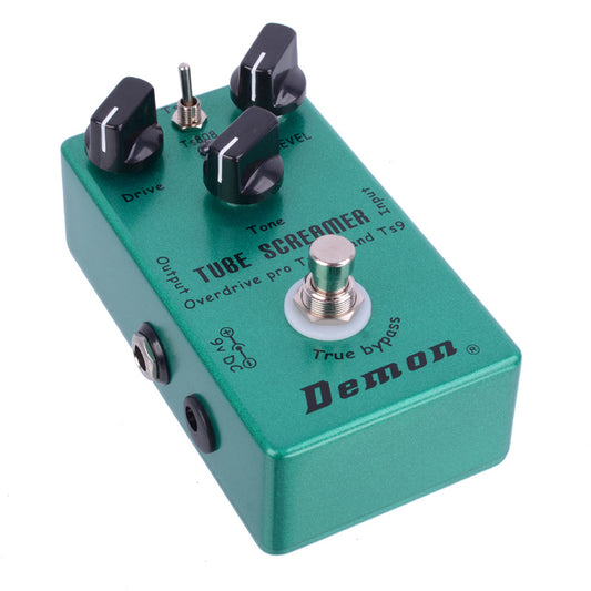 A green guitar effects pedal with black knobs and a switch, labeled 'TUBE SCREAMER' and 'Demon'.