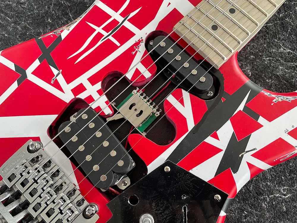 Reprodution of Eddie Van Halen’s I Iconic Electric Guitar with Tremolo Leaning Bridge Pickup,banana long head, Black and White Stripes,High Quality,free shipping