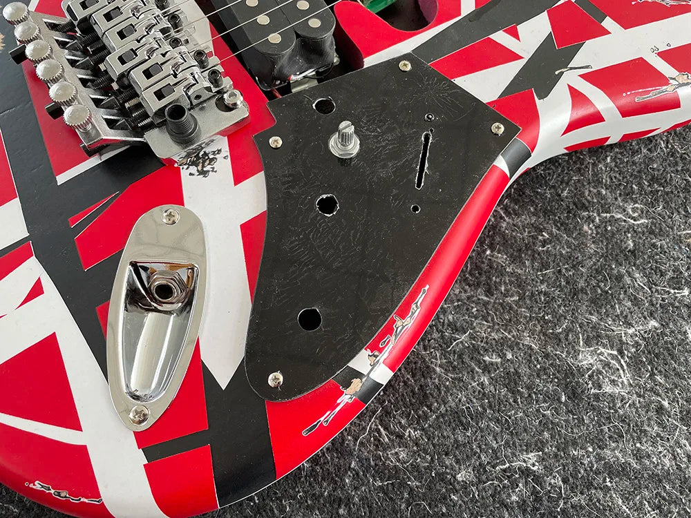 Reprodution of Eddie Van Halen’s I Iconic Electric Guitar with Tremolo Leaning Bridge Pickup,banana long head, Black and White Stripes,High Quality,free shipping