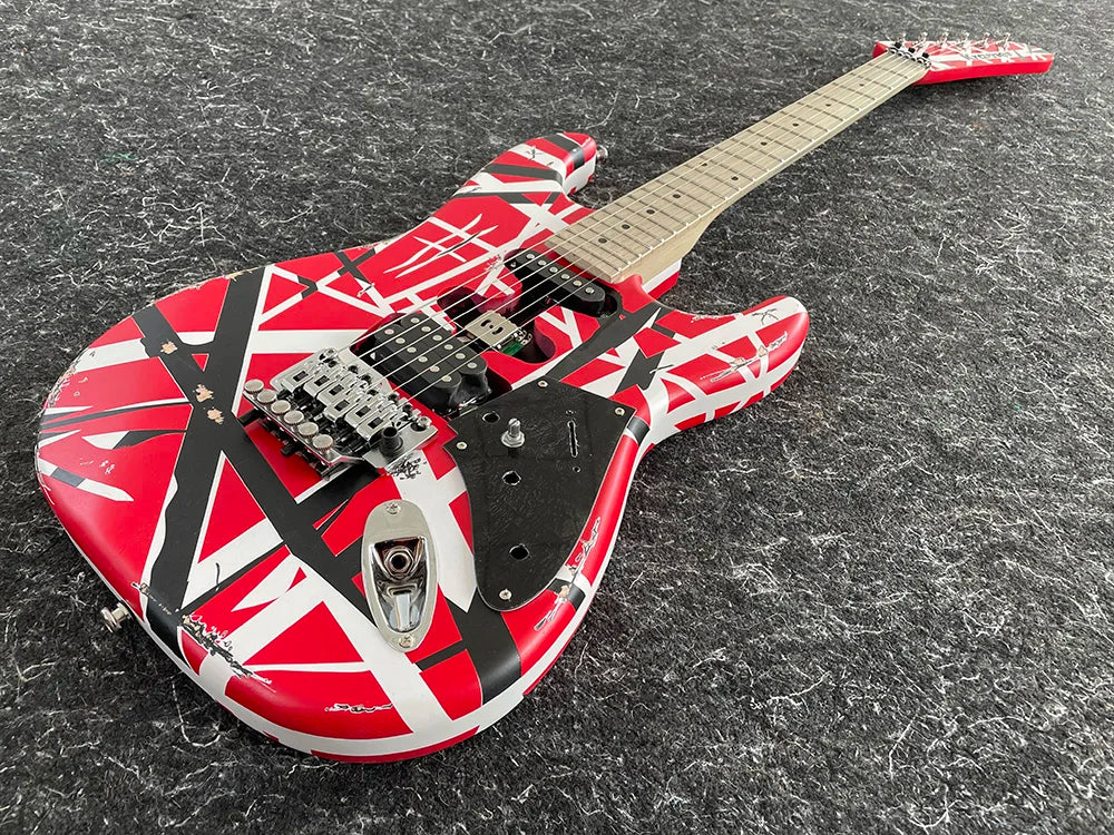 Reprodution of Eddie Van Halen’s I Iconic Electric Guitar with Tremolo Leaning Bridge Pickup,banana long head, Black and White Stripes,High Quality,free shipping 40 inches