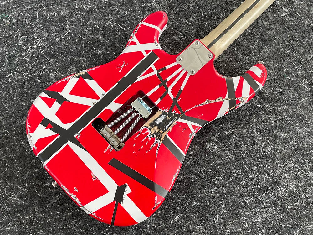 Reprodution of Eddie Van Halen’s I Iconic Electric Guitar with Tremolo Leaning Bridge Pickup,banana long head, Black and White Stripes,High Quality,free shipping
