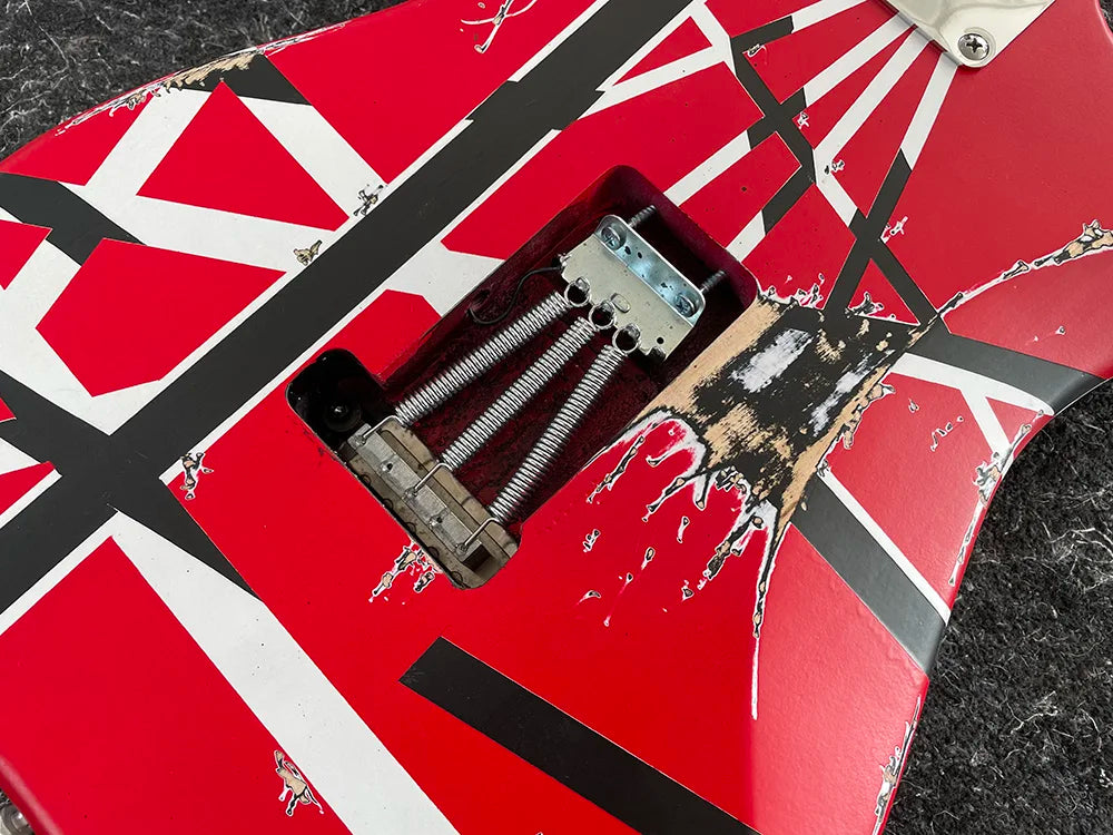 Reprodution of Eddie Van Halen’s I Iconic Electric Guitar with Tremolo Leaning Bridge Pickup,banana long head, Black and White Stripes,High Quality,free shipping