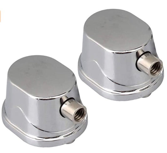 A pair of silver electroplated snare drum set drum ears.