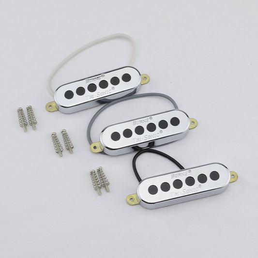 A set of three single-coil electric guitar pickups with chrome finish and black and white covers, along with mounting screws.