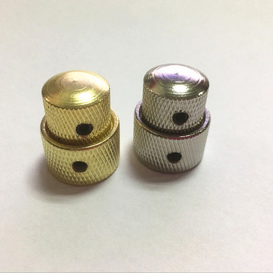 Two double-layer metal guitar volume knobs, one in gold and one in silver color, with a hex wrench included.